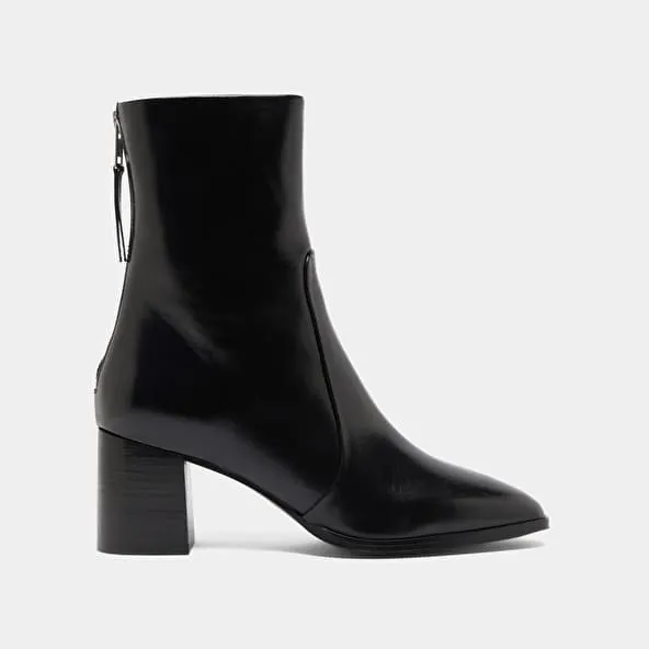 Ankle boots with rear zips in black leather