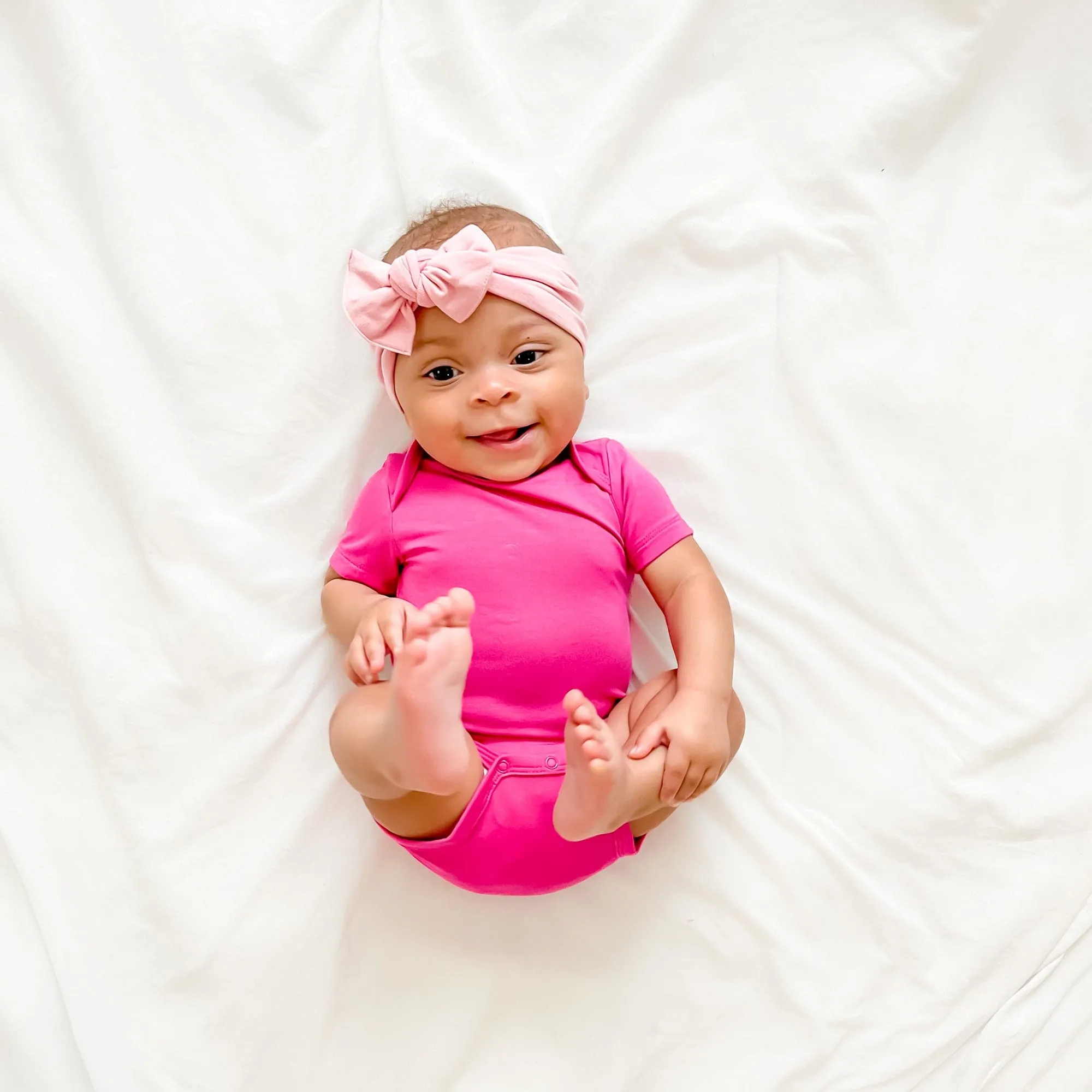 Bodysuit in Raspberry